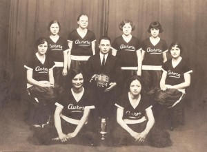 The Aurora High School’s 1924 Victorious Girls' Basketball Team. 1st row seated l-r: Nellie (Nella) Isham & Mabel Jackson, second row, Agnes Dreyer, Coach & Principal J.O. Fox, & Alice Dreyer, third row, Lois Riley, Leila Riley, Florence Dreese. The Dreyer twins in the second row are Donna Mattmuller and Jane Burns' Mother and Aunt.
