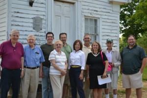 Board members gathered at the Deed house before the August meeting